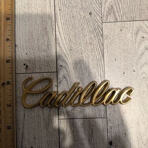 Cadillac Gold Emblem